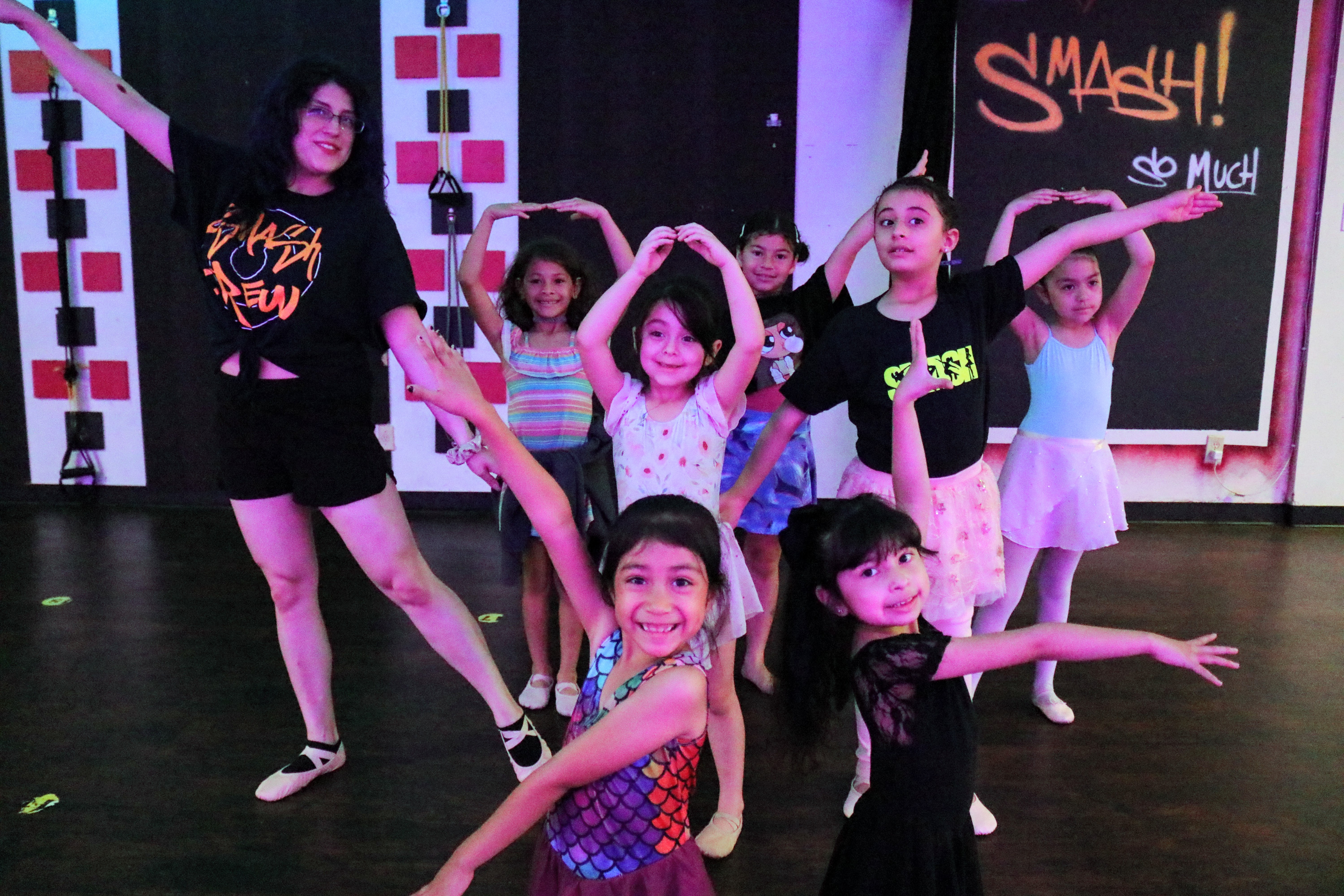 Kids dancing with their SMASH instructor
