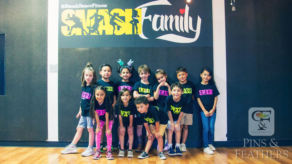 Kids posing together at SMASH Dance Studio