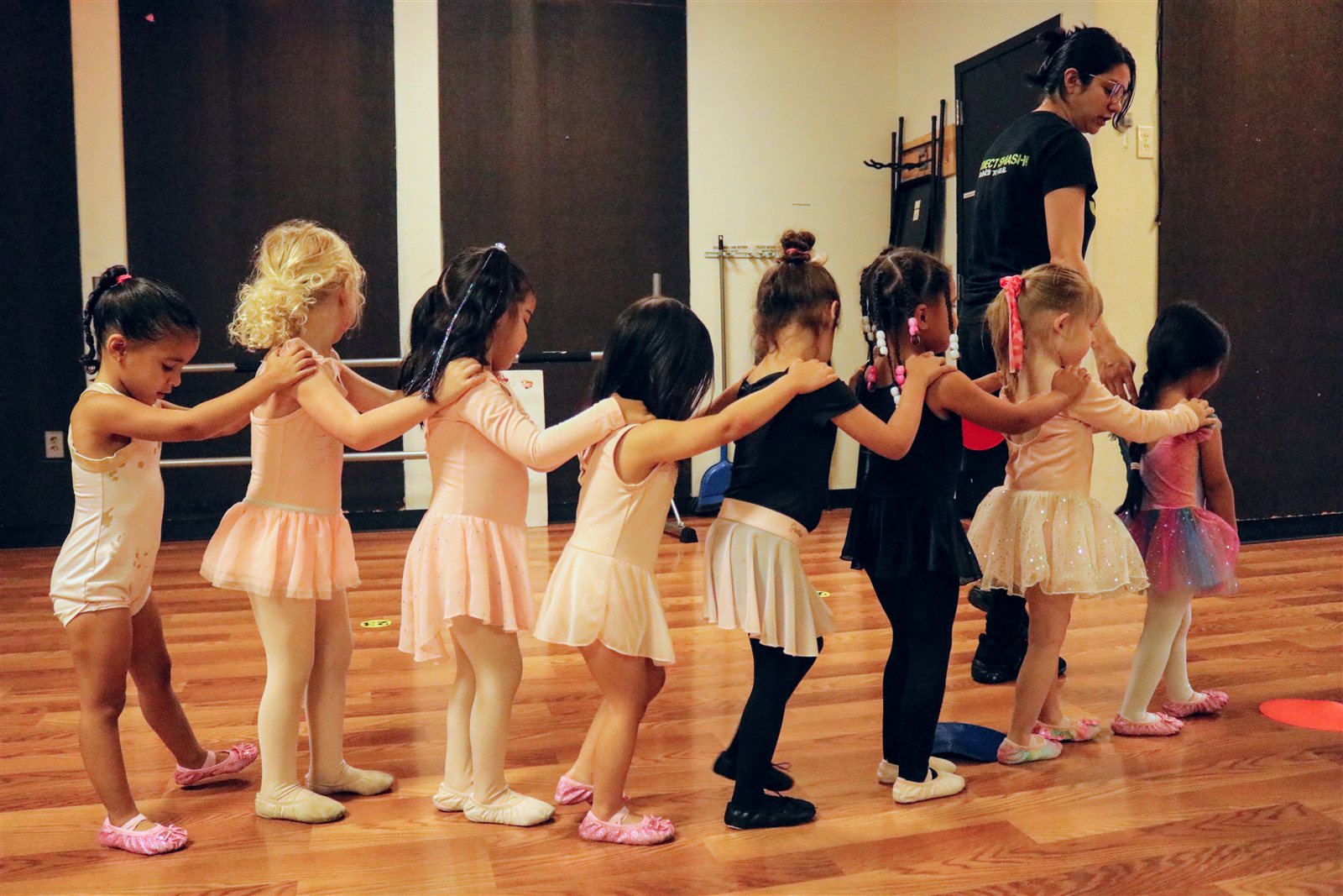 Children following a dance instructor