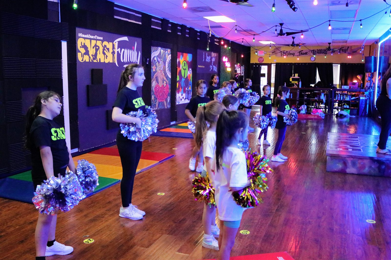 Project SMASH students practicing with pom-poms