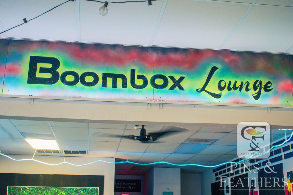 Boombox Lounge sign at the studio