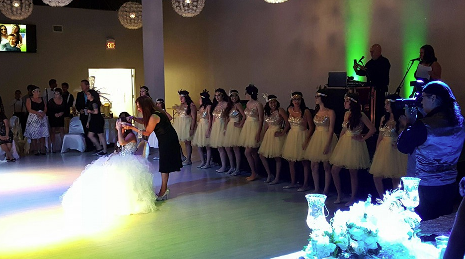 Quinceañera celebrating with her choreography court
